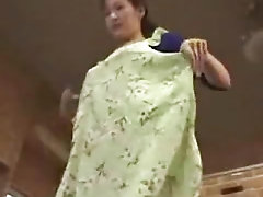 Sexy Asian milf fucks wildly with hunk on the sofa